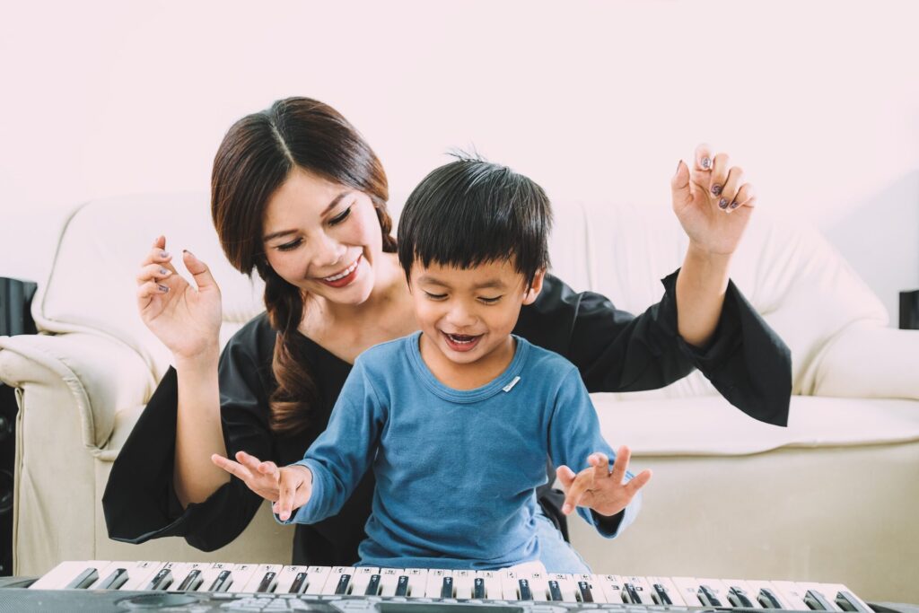 mother-child-piano-shutterstock_716813932_sutadimages-scaled.jpg
